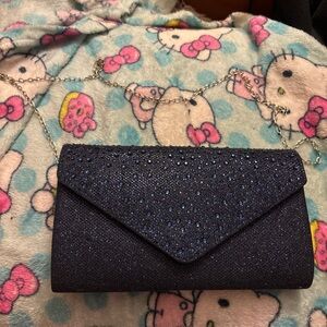 Navy blue clutch purse with silver chain